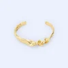 Adolfo Dominguez Bijuteria*Bracelet Metallique Motif Torsion Dore